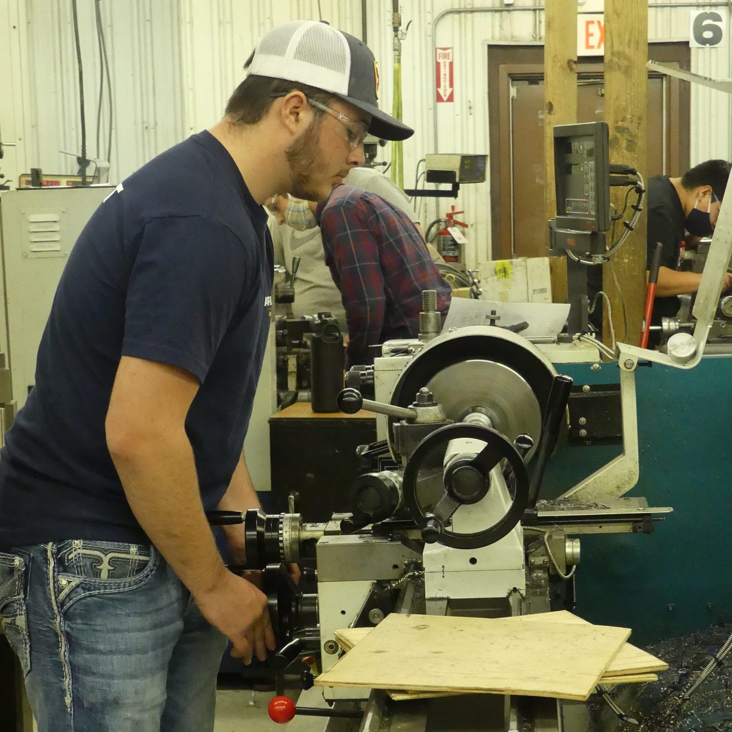 Student learns machining at Impact Institute